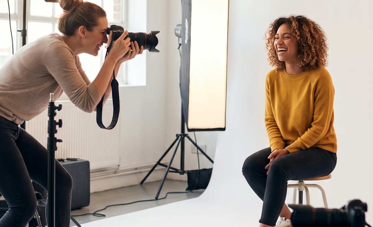 Photographer shooting a portrait in a studio